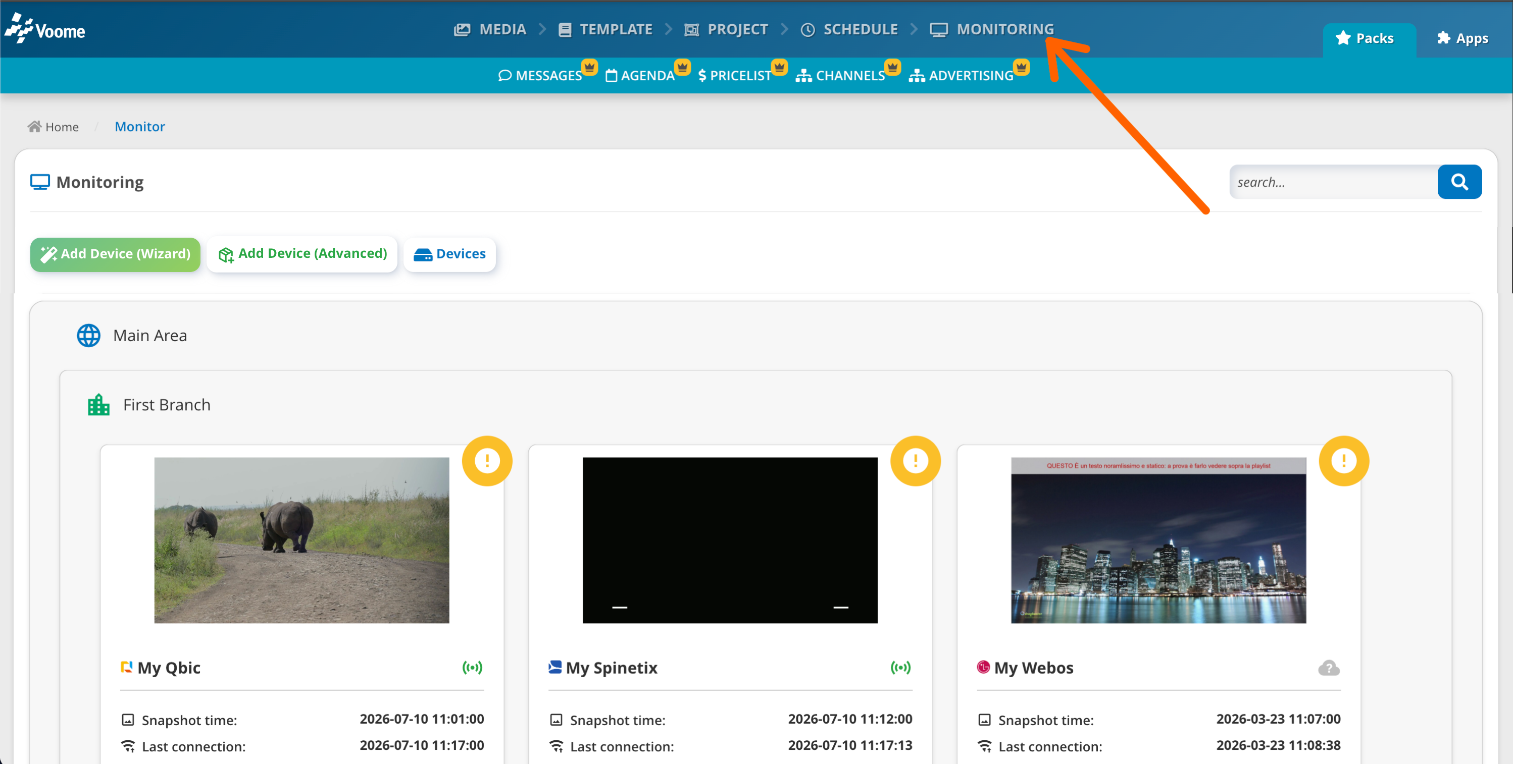 The Monitoring item in the main navigation, opening a grid of device cards grouped by area and branch